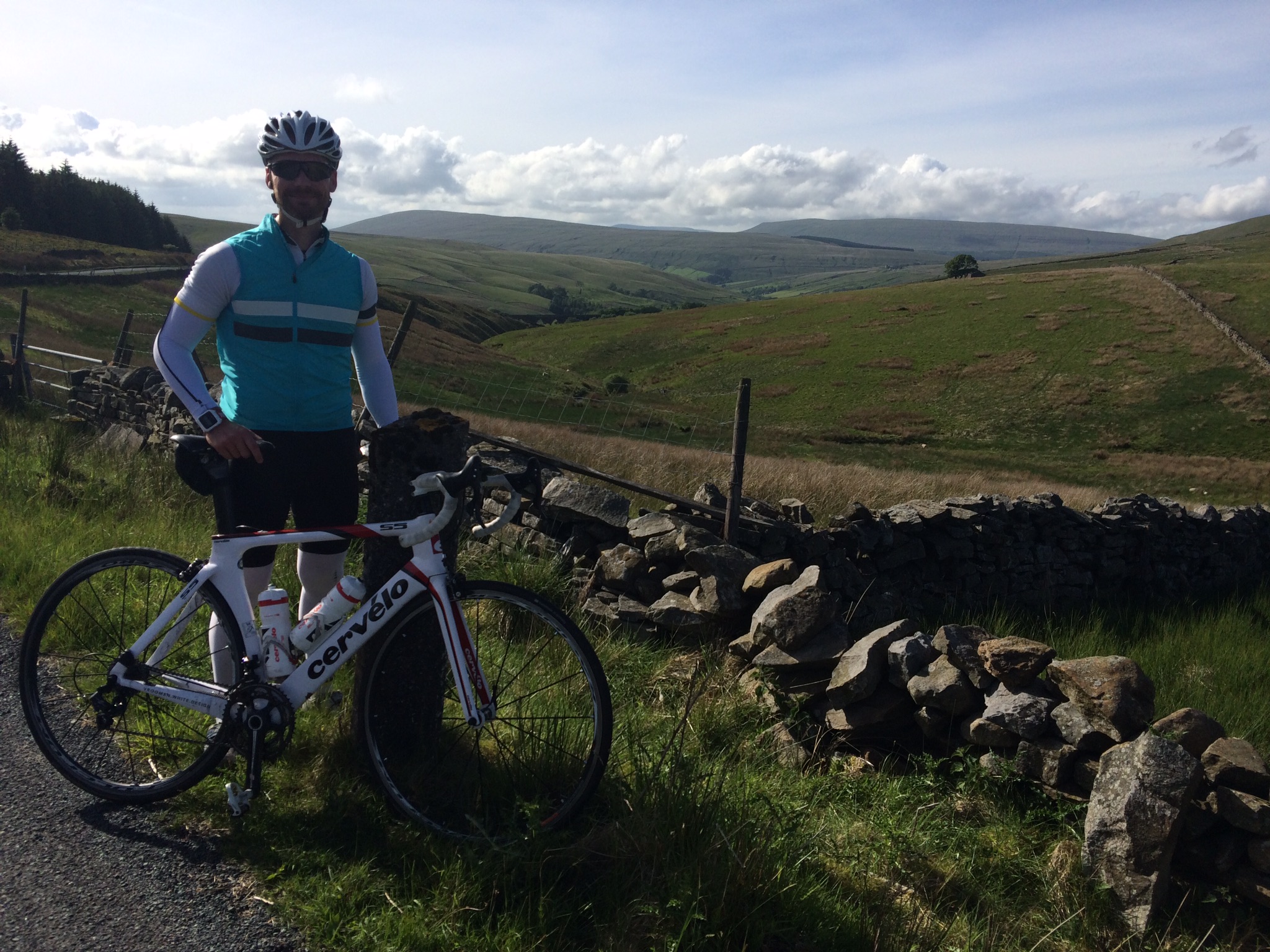 Brendan Ellis with his bike during the Coast to Coast ride across the UK