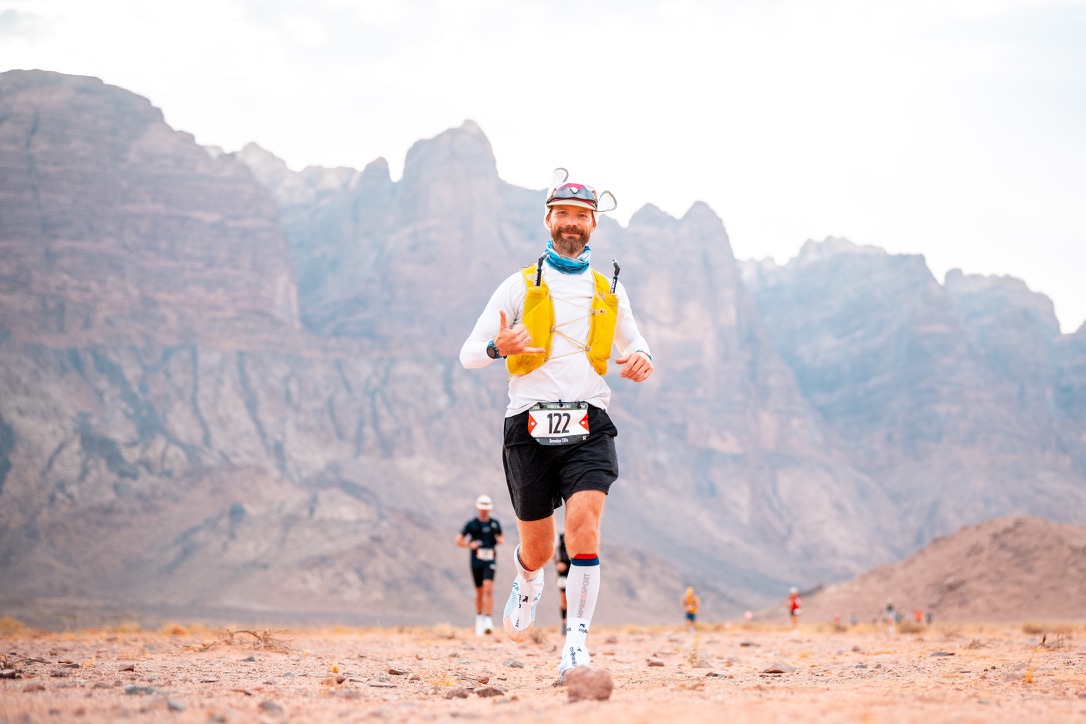 Brendan Ellis running through the desert during Ultra X Jordan